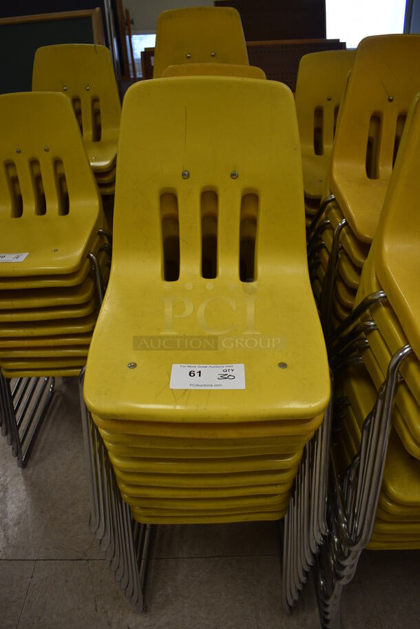 30 Yellow Poly Chairs on Metal Legs. BUYER MUST REMOVE. 16x18x27. 30 Times Your Bid! (Clearview Elementary - Room 10) - Image 1 of 3
