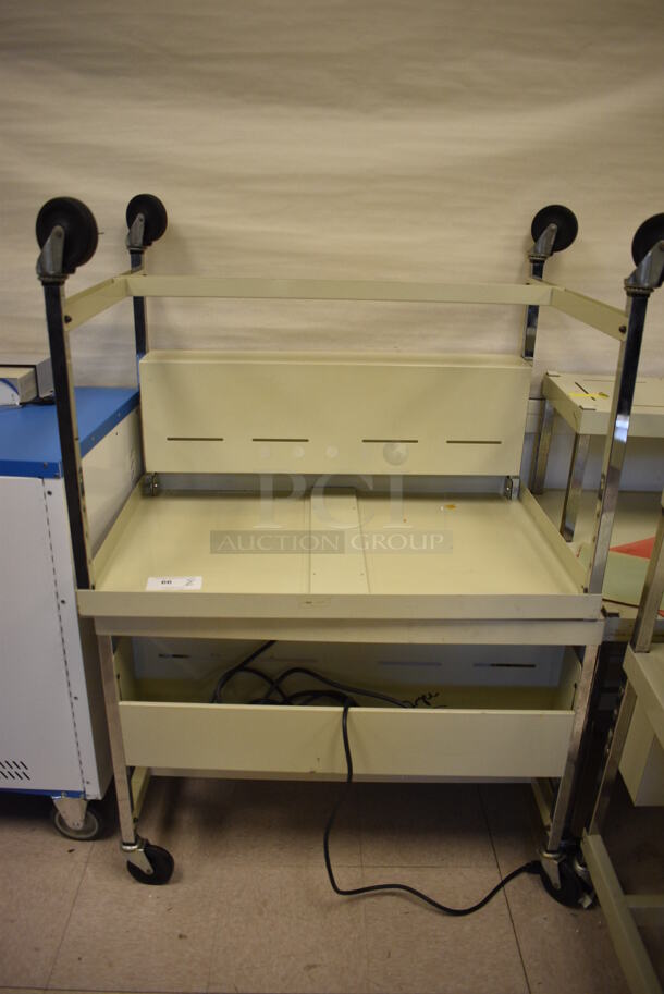 2 Metal Desks on Commercial Casters. BUYER MUST REMOVE. 36x24x27. 2 Times Your Bid! (Clearview Elementary - Room 8) - Image 1 of 3
