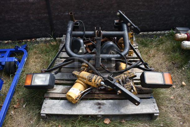 ALL ONE MONEY! Pallet Lot of Various Items Including Meyer E-60 Snow Plow Hydraulic Plow Pump, Headlights and Cord. BUYER MUST REMOVE. Includes 51x21x44. (stadium)