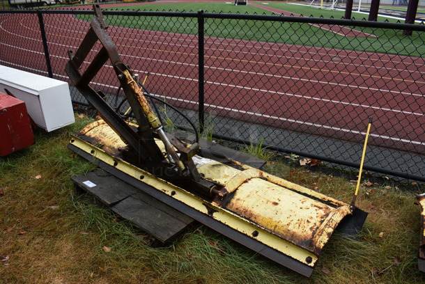 Meyer Model ST-00 Yellow Metal Front Hitch Snow Plow Attachment. BUYER MUST REMOVE. 90x26x49. (stadium)