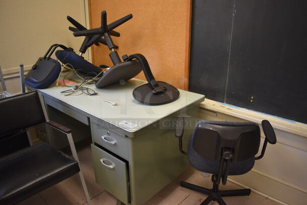 Metal Desk w/ 4 Drawers and 3 Various Chairs. BUYER MUST REMOVE. 60x30x29. (Clearview Elementary - Room 7)