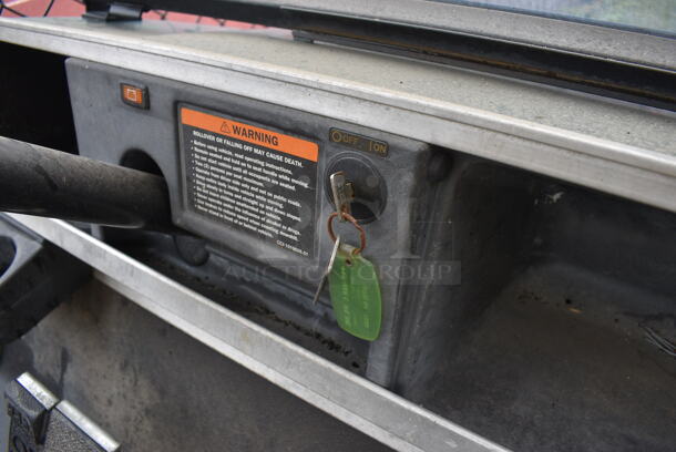 Green Electric Powered Golf Cart w/ Battery Charger. Needs New Battery. Comes w/ 1 Key. BUYER MUST REMOVE. 42x101x67.5. (stadium) - Image 6 of 11