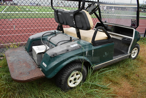 Green Electric Powered Golf Cart w/ Battery Charger. Needs New Battery. Comes w/ 1 Key. BUYER MUST REMOVE. 42x101x67.5. (stadium) - Image 10 of 11
