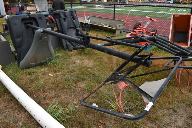 Metal Floor Style Basketball Hoop. No Net or Backboard. BUYER MUST REMOVE. 48x46x127. (stadium)