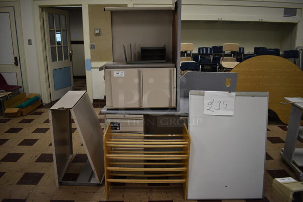 ALL ONE MONEY! Lot of 5 Various Items Including Desks, Board and Wooden Rack. BUYER MUST REMOVE. Includes 29x15x26. (Clearview Elementary - Room 1)