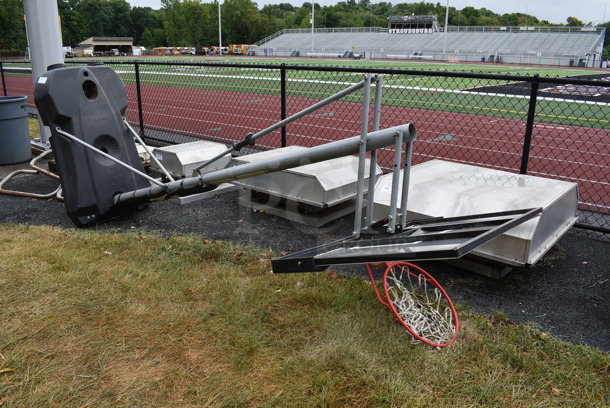 Spalding Metal Floor Style Basketball Hoop. BUYER MUST REMOVE. 52x48x132.5. (stadium) - Image 1 of 9