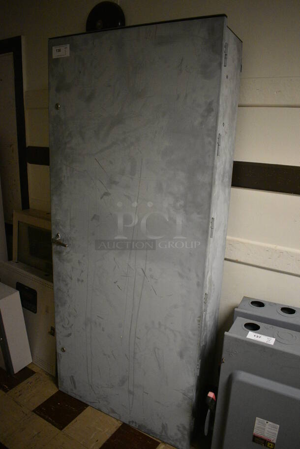 Gray Metal Cabinet. BUYER MUST REMOVE. 33x14x75