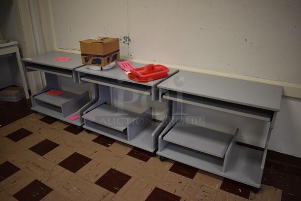 3 Gray Desks on Casters w/ Contents. BUYER MUST REMOVE. 36x30x29.5. 3 Times Your Bid! (Clearview Elementary - Room 1)