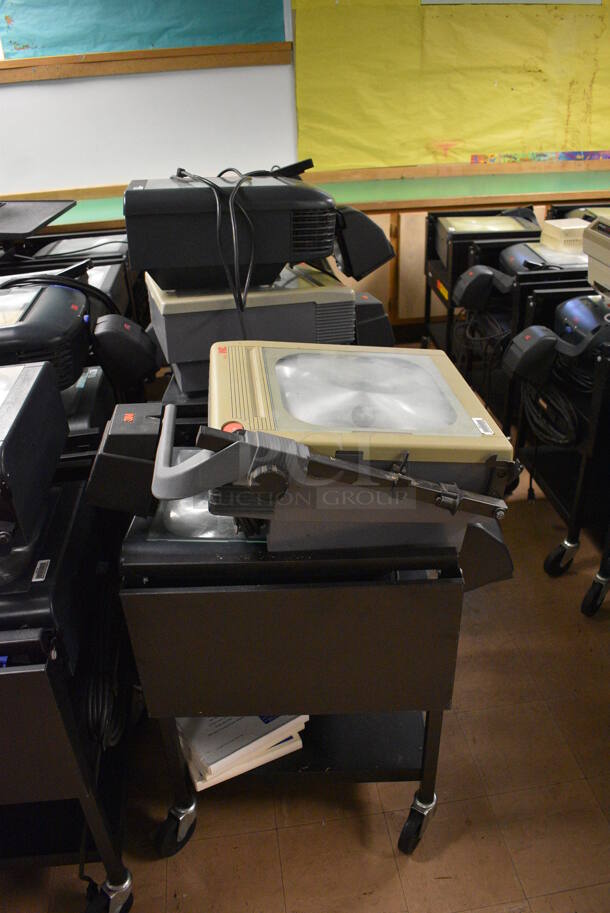 21 Black Metal AV Carts w/ Approximately 30 Overhead Projectors. BUYER MUST REMOVE. Includes 18x24x39. 21 Times Your Bid! (Clearview Elementary - Lower Level) - Image 2 of 7