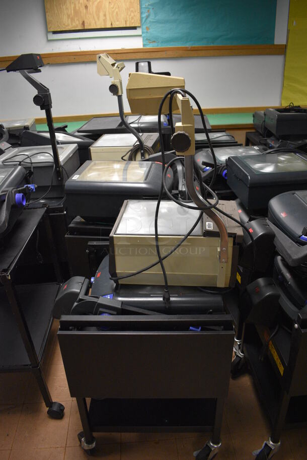 21 Black Metal AV Carts w/ Approximately 30 Overhead Projectors. BUYER MUST REMOVE. Includes 18x24x39. 21 Times Your Bid! (Clearview Elementary - Lower Level) - Image 4 of 7