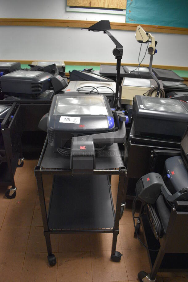 21 Black Metal AV Carts w/ Approximately 30 Overhead Projectors. BUYER MUST REMOVE. Includes 18x24x39. 21 Times Your Bid! (Clearview Elementary - Lower Level) - Image 5 of 7