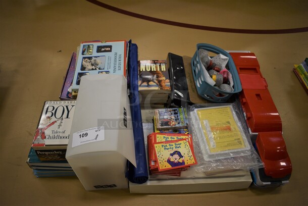 ALL ONE MONEY! Lot of Various Items Including Roald Dahl Books, Put On Your Party Hat Books and Truck Toy. (Chipperfield Elementary Gym)