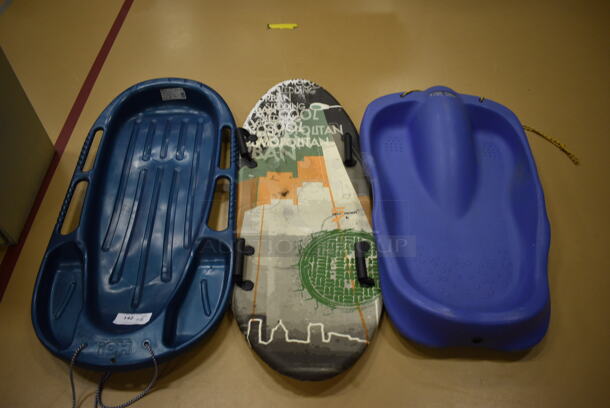 3 Various Sleds. Includes 30x18x50. 3 Times Your Bid! (Chipperfield Elementary Gym)