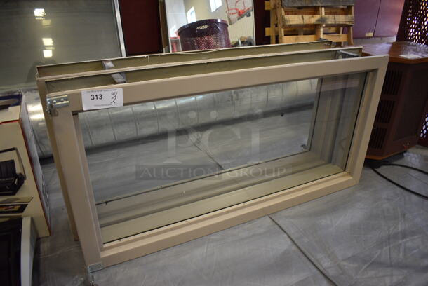 2 Metal Framed Glass Panes. 24x6x48. 2 Times Your Bid! (Middle School Gym)