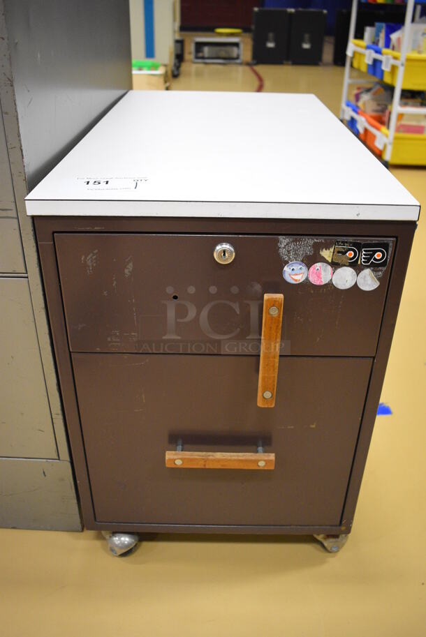 Brown Metal 2 Drawer Filing Cabinet on Casters. 15x29x21.5 (Chipperfield Elementary Gym)