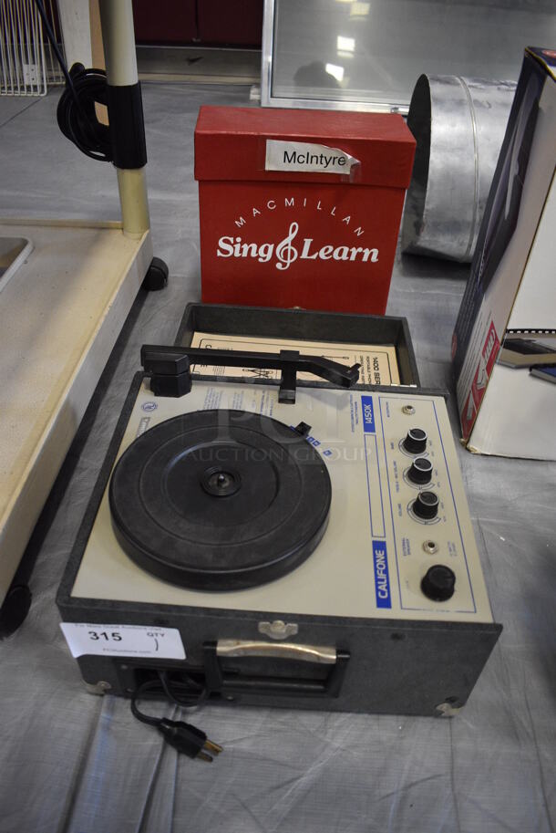 Califone 1450K Countertop Record Player and Box of Records. 14.5x13x9. (Middle School Gym)