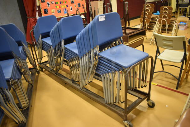 22 Blue Poly Chairs on Metal Frame w/ Metal Cart on Commercial Casters. 18x22x33.5, 98x22x38.5. 22 Times Your Bid! (Chipperfield Elementary Gym)
