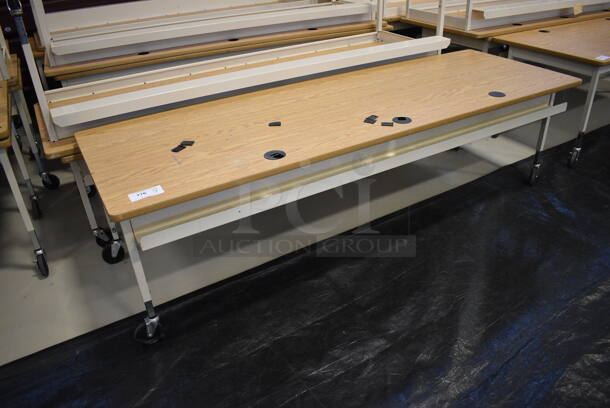 7 Tables w/ Wood Pattern Tabletops and Tan Metal Legs on Commercial Casters. 90.5x30x30. 7 Times Your Bid! (Middle School Gym)