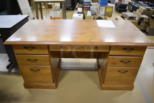 Wood Pattern Desk w/ 5 Drawers. 59.5x29.5x29. (Chipperfield Elementary Gym)