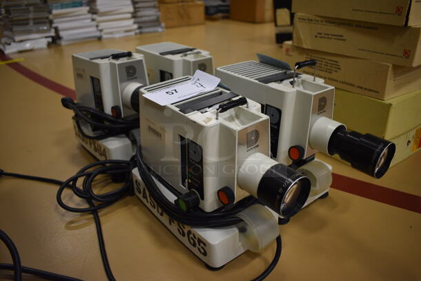 4 Dukane Model 28A75 Countertop Film Strip Projectors. 4.5x13x8. 4 Times Your Bid! (Chipperfield Elementary Gym)