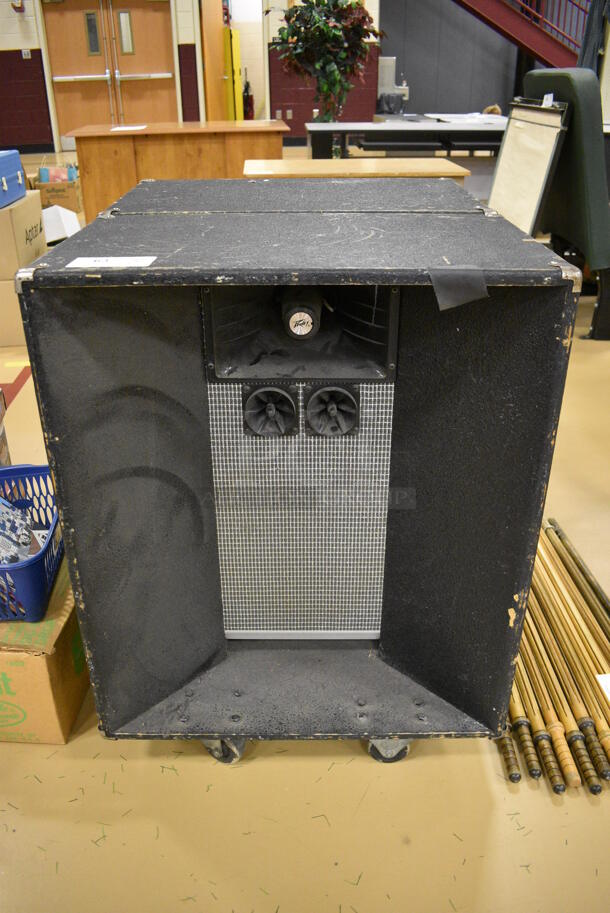 2 Peavey Model C-700 8 ohm Speakers on Casters. 27x16x33. 2 Times Your Bid! (Chipperfield Elementary Gym)