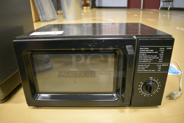 Sears Roebuck Model 565.8701080 Countertop Microwave Oven. 120 Volts, 1 Phase. 18x14x10.5. (Chipperfield Elementary Gym)