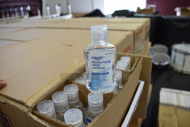 48 Boxes of BRAND NEW! Equate Moisturizing Hand Sanitizer Bottles. 2x1x4. 48 Times Your Bid! (Middle School Gym)