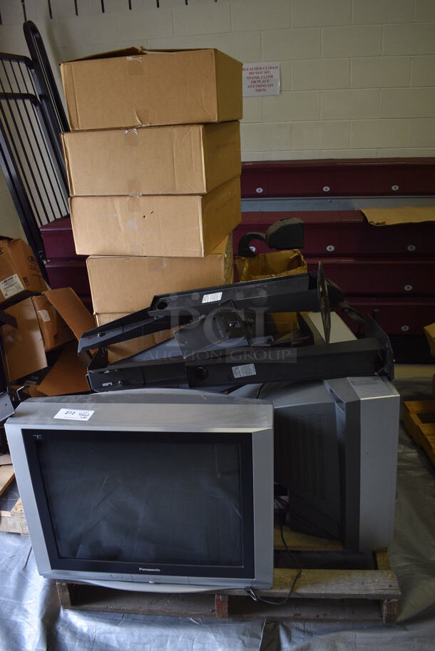 ALL ONE MONEY! PALLET LOT of Various Items Including 2 Panasonic Televisions and 3M Overhead Projectors. (Middle School Gym)