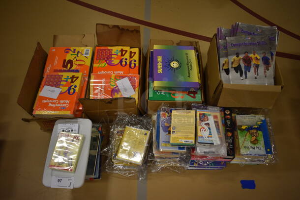 ALL ONE MONEY! Lot of Various Items Including Connecting Math Concept Books, Comprehension Skills and Sunshine Assessment Resource Kits. (Chipperfield Elementary Gym)