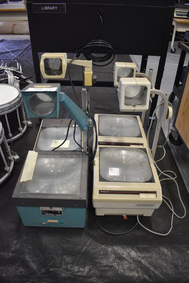 ALL ONE MONEY! Lot of 4 Various Overhead Projectors; Apollo and Belle Howell. Includes 14x14x28. (Middle School Gym)
