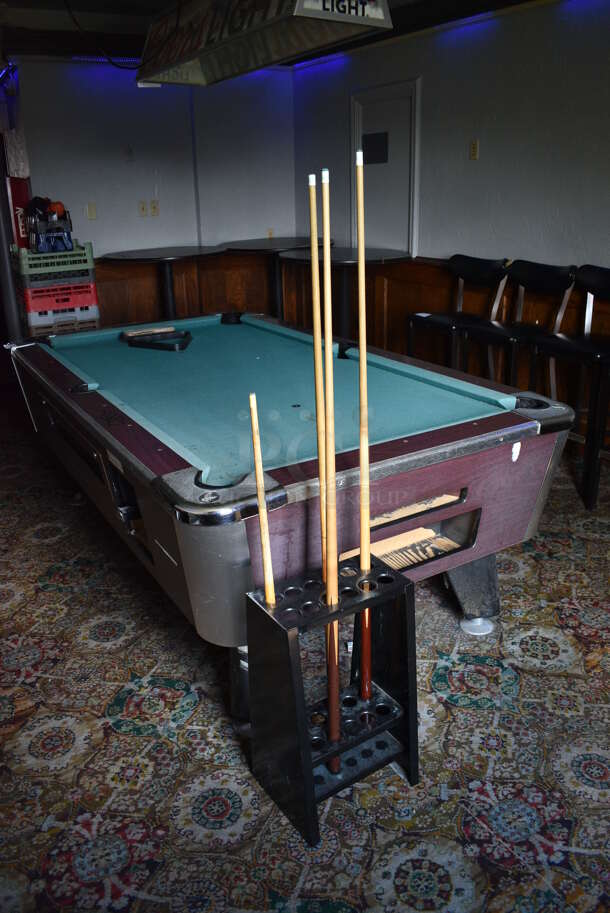 Great American Eagle Coin Operated Pool Table w/ Balls, Ball Rack, 4 Pool Cues, Cue Rack and Brush. BUYER MUST REMOVE. 92x52x33. (bar)