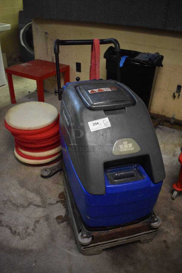Windsor Model SCC172 Metal Commercial Floor Cleaning Machine w/ 10 Cleaning Pads and 2 New Blades. BUYER MUST REMOVE. 30x40x39. Tested and Working! (basement)
