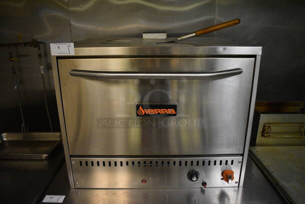 2019 Sierra Model SRPO 36 Stainless Steel Commercial Countertop Natural Gas Powered Pizza Oven w/ Cooking Stones and Pizza Peel. Item Was in Working Condition on Last Day of Business. 36x29x28.5. (kitchen)