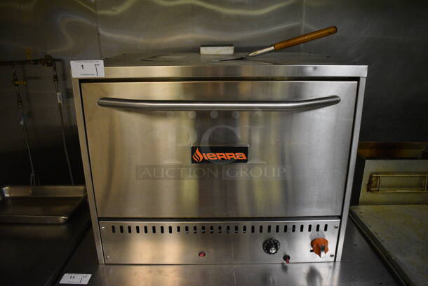 2019 Sierra Model SRPO 36 Stainless Steel Commercial Countertop Natural Gas Powered Pizza Oven w/ Cooking Stones and Pizza Peel. Item Was in Working Condition on Last Day of Business. 36x29x28.5. (kitchen) - Image 1 of 6