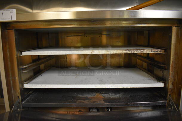 2019 Sierra Model SRPO 36 Stainless Steel Commercial Countertop Natural Gas Powered Pizza Oven w/ Cooking Stones and Pizza Peel. Item Was in Working Condition on Last Day of Business. 36x29x28.5. (kitchen) - Image 6 of 6
