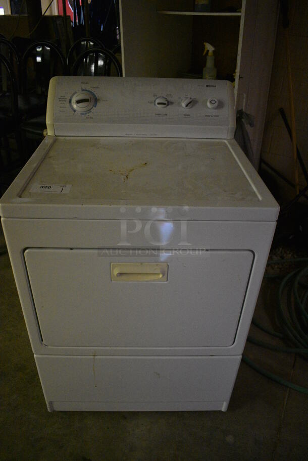 Kenmore Metal Front Load Dryer. BUYER MUST REMOVE. 27x27x43. (basement)