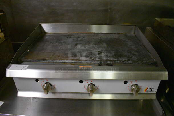 CPG Stainless Steel Commercial Countertop Natural Gas Powered Flat Top Griddle w/ Thermostatic Controls. Item Was in Working Condition on Last Day of Business. 36x30x16. (kitchen)