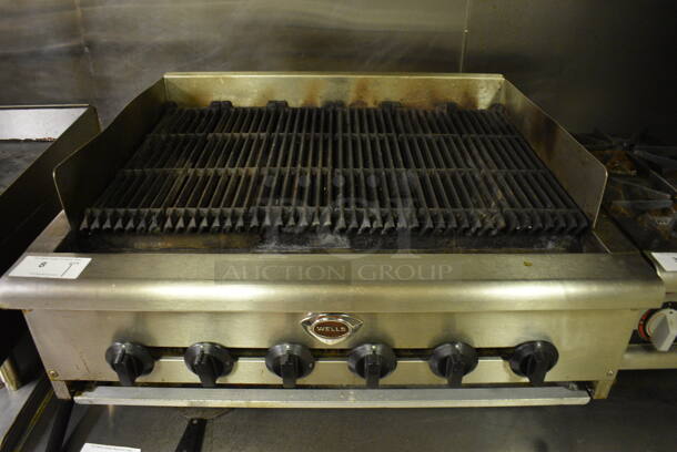 Wells Stainless Steel Commercial Countertop Natural Gas Powered Charbroiler Grill w/ Cleaning Brush and Scraper. Item Was in Working Condition on Last Day of Business. 36x31x18. (kitchen)