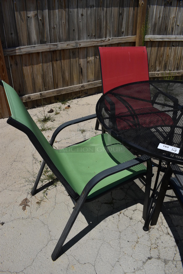 Black Mesh Metal Patio Table w/ 4 Patio Chairs; 2 Green, 1 Red and 1 Blue. 48x48x28, 25x30x37. (patio) - Image 2 of 4