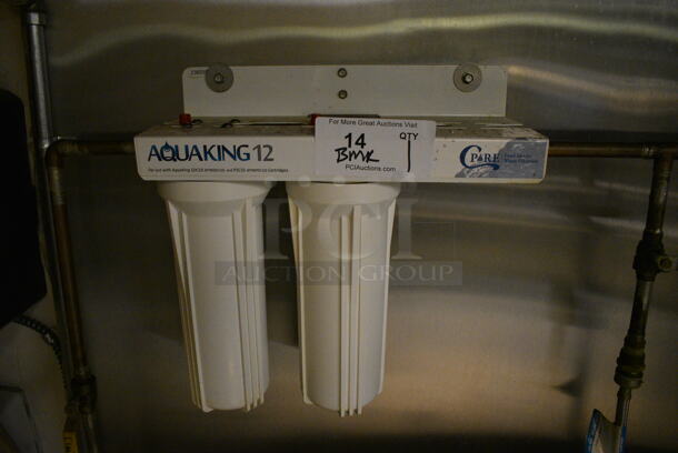 Aquaking 12 Cpore Wall Mount Water Filter. BUYER MUST REMOVE. 14x6x14. (kitchen)