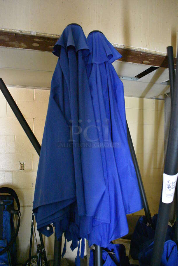 10 Blue Patio Umbrellas and 2 Trash Cans of Umbrella Bases. 87". 10 Times Your Bid! (basement) - Image 2 of 5