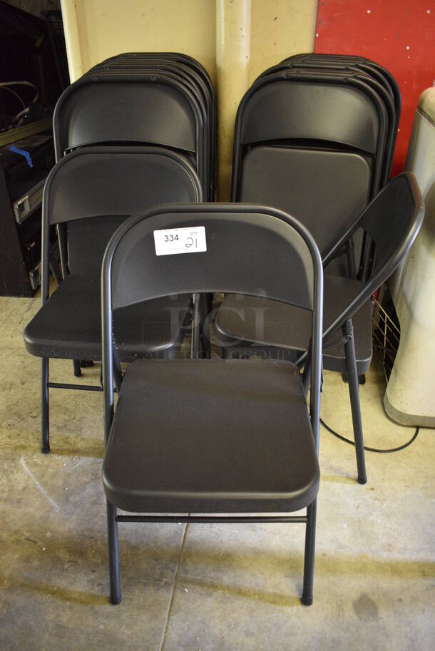 21 Black Metal Folding Chairs. 18x16x32. 21 Times Your Bid! (basement)