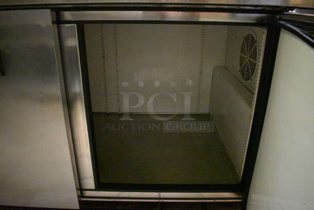 True Model TWT-67 Stainless Steel Commercial 2 Door Work Top Cooler on Commercial Casters. Does Not Come w/ Over Shelf. 115 Volts, 1 Phase. 67.5x32x39. Tested and Working! (kitchen) - Image 3 of 5