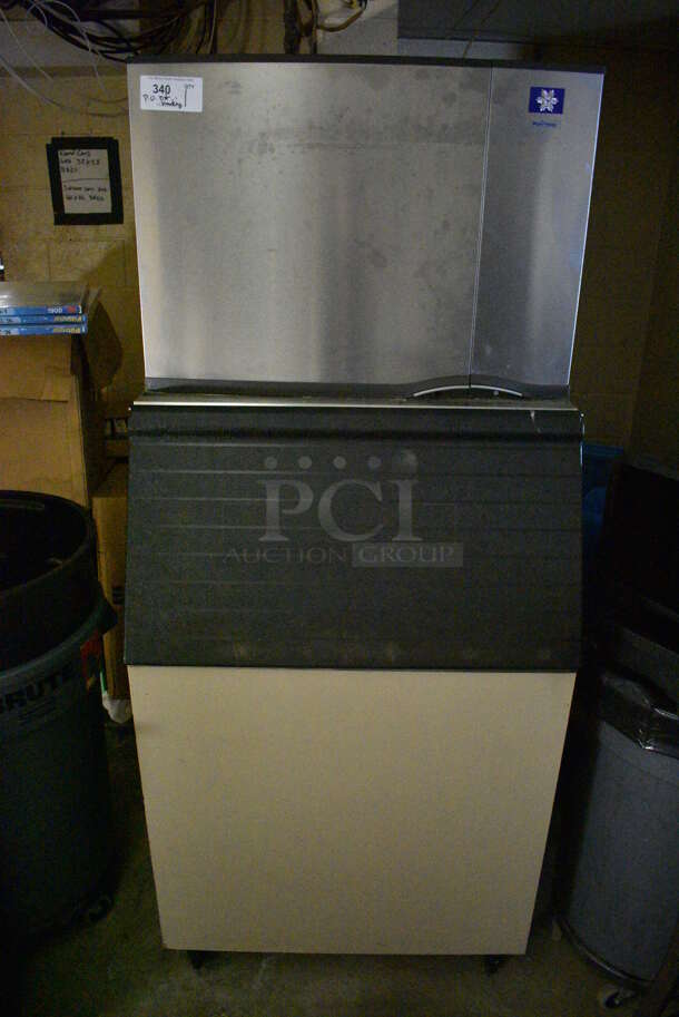 Manitowoc Model SY0604A Stainless Steel Commercial Ice Head on Commercial Ice Bin. BUYER MUST REMOVE. 208-230 Volts, 1 Phase. 30x36x72. Tested and Powers On But Does Not Function. (basement)