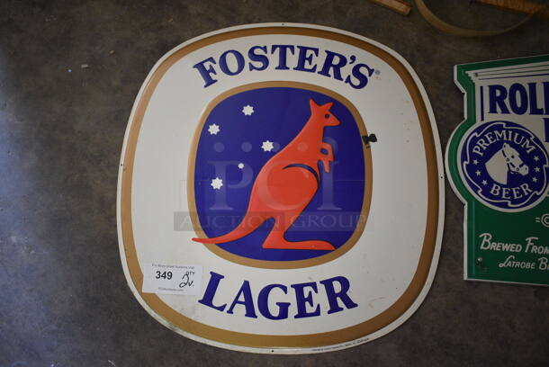 2 Various Metal Signs; Fosters and Rolling Rock. 16x19, 23.5x23.5. 2 Times Your Bid! (basement) - Image 3 of 3