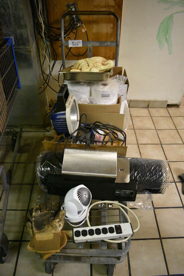 Metal Flat Cart w/ Contents Including Light, Fan, Power Strip, Gloves and Ketchup. 19x54x39. (kitchen) - Image 1 of 7