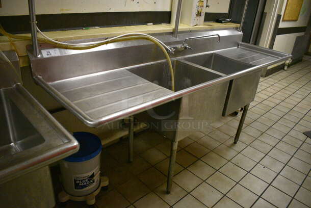 Stainless Steel Commercial 2 Bay Sink w/ Dual Drain Boards, Faucet, Handles and Pot Rack. BUYER MUST REMOVE. 97x28x90. Bays 22x22x14. Drain Boards 24x24x2. (dishwasher area) - Image 3 of 7