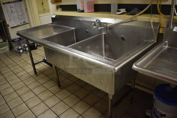 Stainless Steel Commercial 2 Bay Sink w/ Left Side Dual Drain Board, Faucet, Handles. BUYER MUST REMOVE. 79x30x42.5. Bays 23x24x14. Drain Board 28x26x1. (dishwasher area) - Image 4 of 5