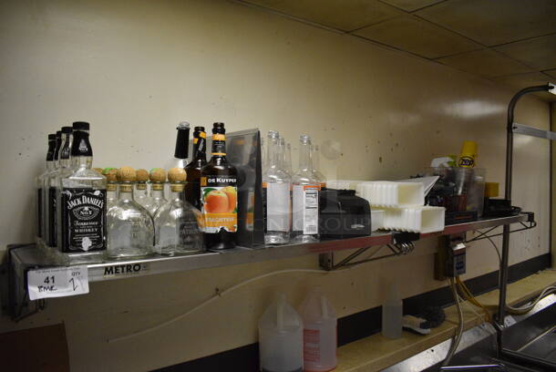 2 Metro Metal Wall Mount Shelves w/ Contents Including Bottles and Bar Topping Inserts. BUYER MUST REMOVE. 42x14x7.5. 2 Times Your Bid! (dishwasher area) - Image 1 of 9