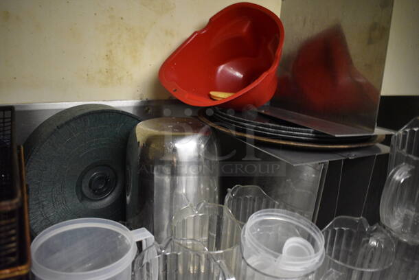 Stainless Steel Wall Mount Shelf w/ Contents Including Metal Fry Baskets and Poly Pitchers. BUYER MUST REMOVE. 42x22x12. (dishwasher area) - Image 5 of 6